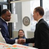 Congressman jackson shaking hands with military academy nominee