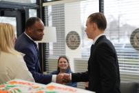 Congressman jackson shaking hands with military academy nominee